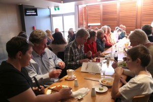 John Kellaway enjoys a coffee with band members and their families