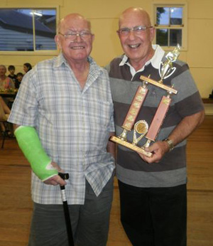 Max Forbes accepts the Encouragement Trophy for musical director Ron Boaden.